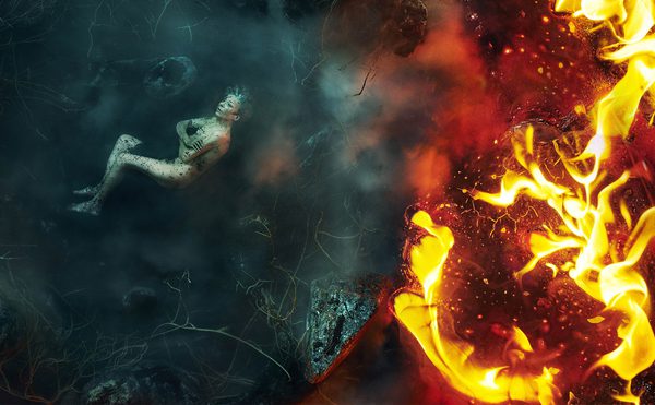 Surreal scene featuring a person lying on the left side, surrounded by dark, smokey, and watery elements, contrasted by bright flames and fiery textures on the right side.