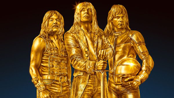 Three golden statues of long-haired individuals with their faces obscured by golden rectangles. The left statue wears a studded vest and pants, the middle one holds a sword and wears a detailed coat, and the right one holds a helmet and wears a padded suit.